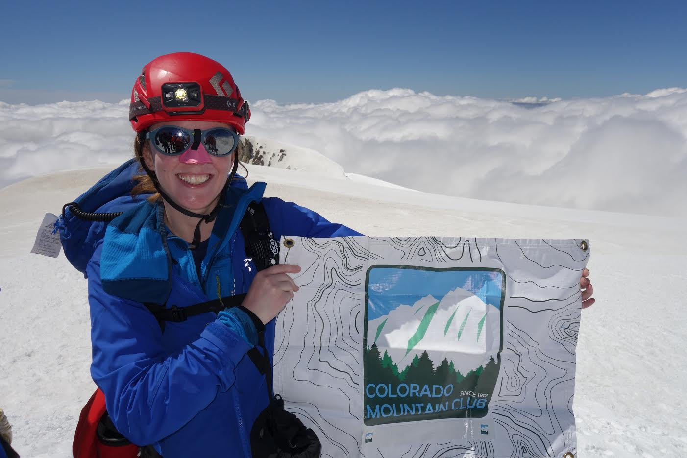 Makayla shows the CMC some love on the summit of Mount Adams, 12,280'.